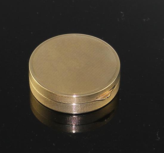 A George V engine turned 9ct gold circular compact, London, 1928, 38mm, gross 21.8 grams.